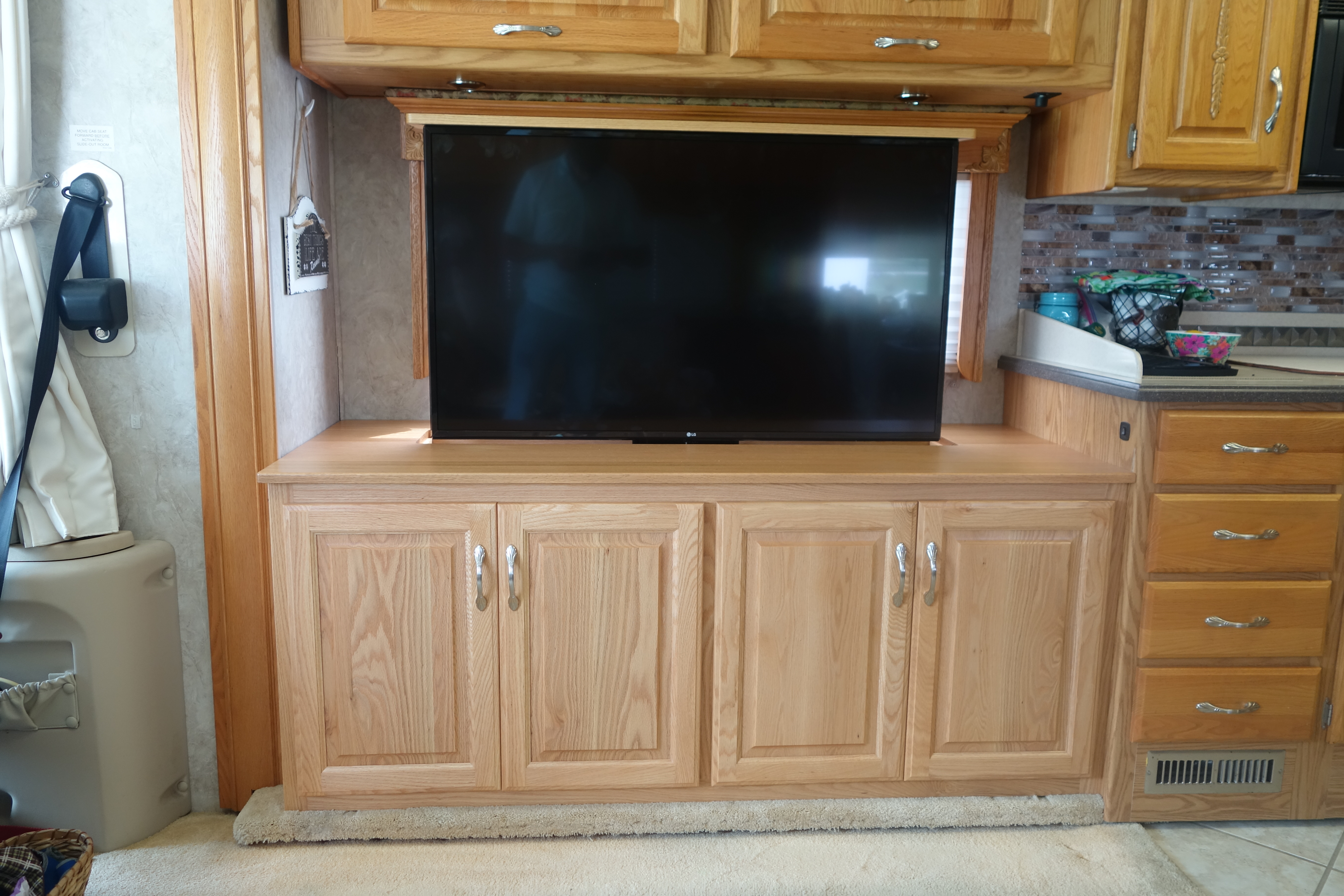 Televator TV cabinet with motorized lift